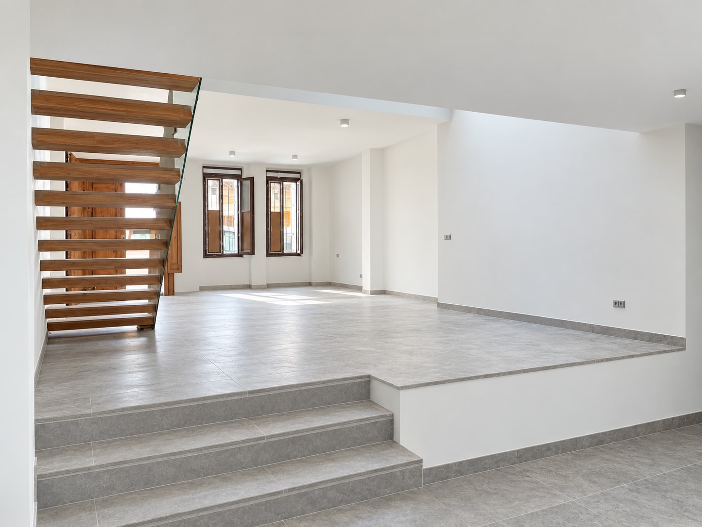 Open living spaces connected across different levels